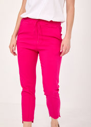 Basic trousers with drawstring and diagonal pockets in fuchsia pink