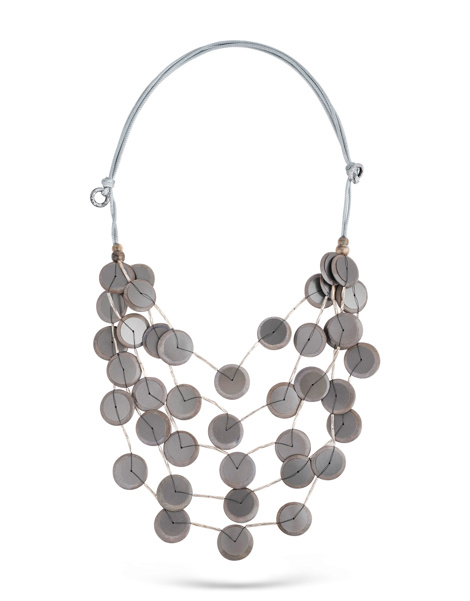 Handmade necklace with coconut buttons, sequins and dark gray plastic beads