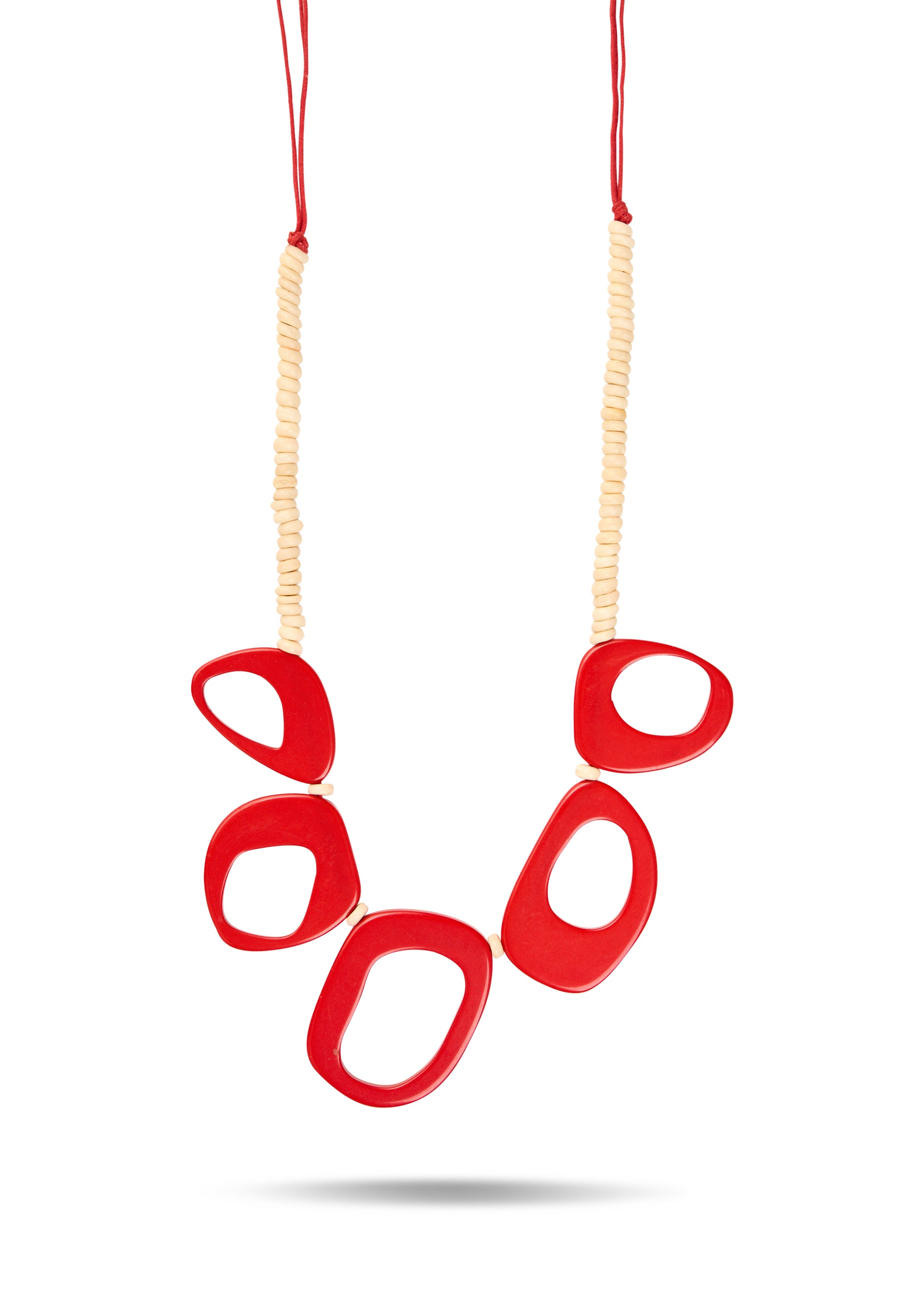 A necklace of small beads and red resin rings