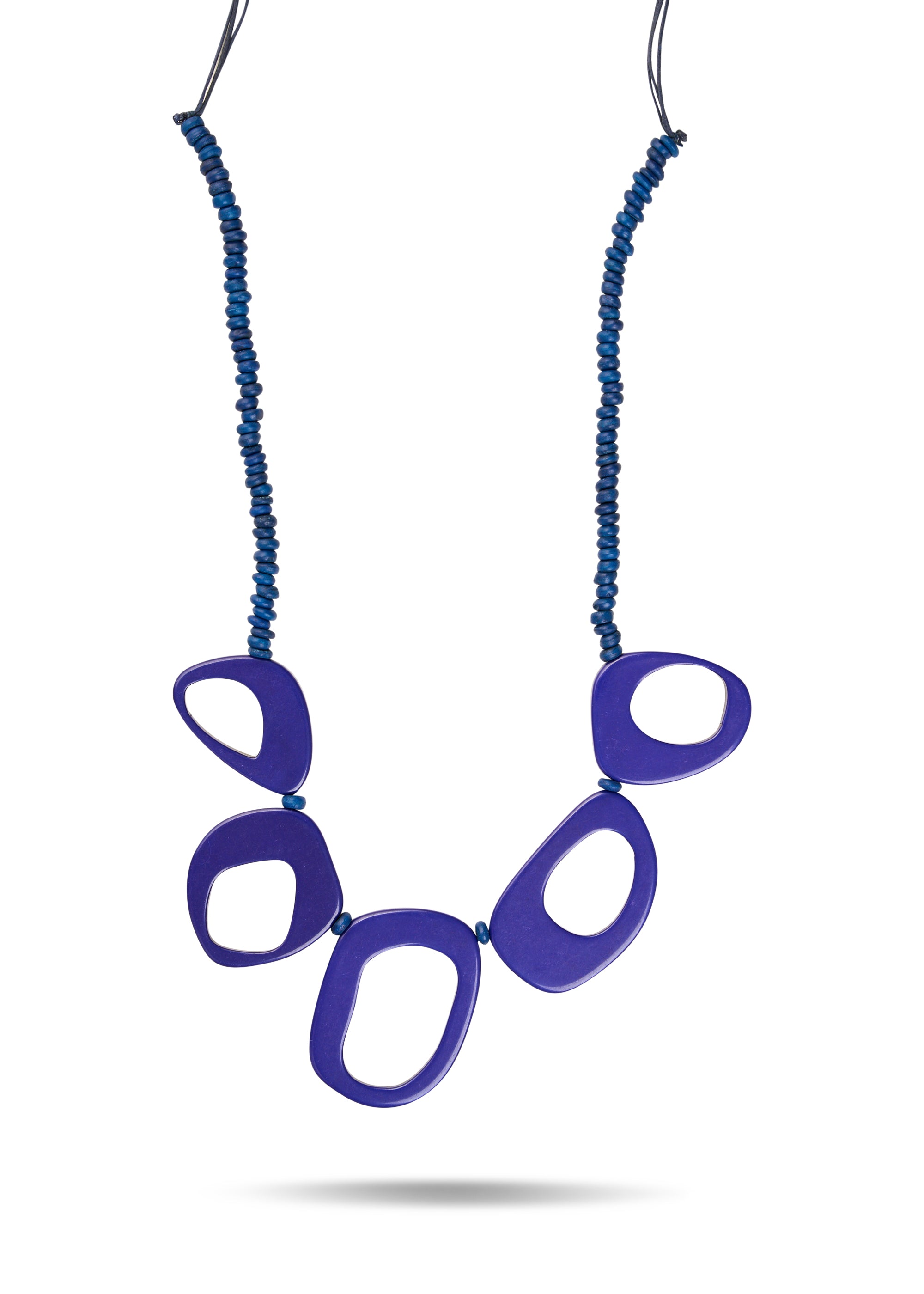 A necklace of small beads and dark blue resin rings