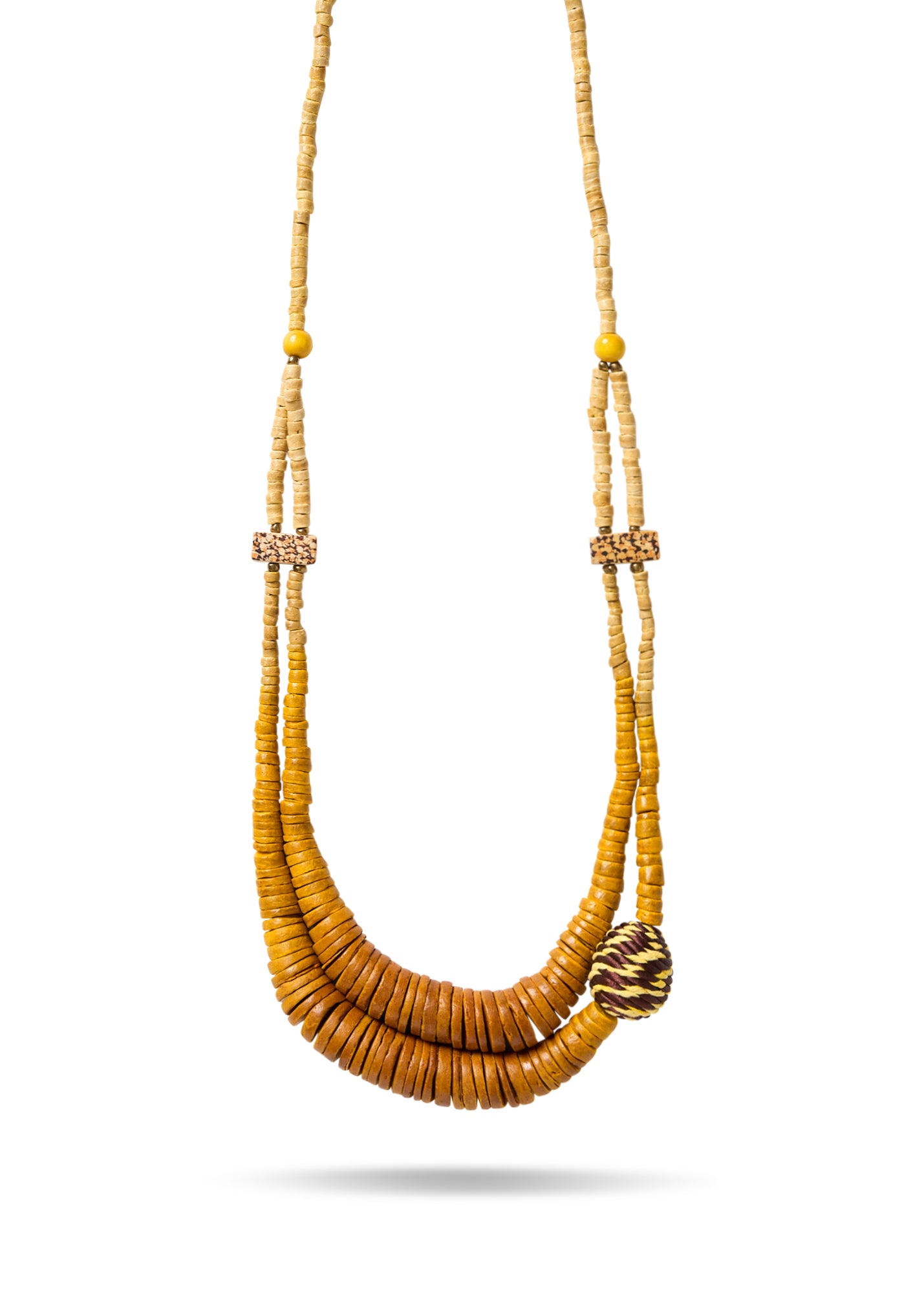 A necklace of coconut discs and a mustard-wrapped bead