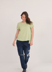 Rounded front short sleeve shirt with green cutouts