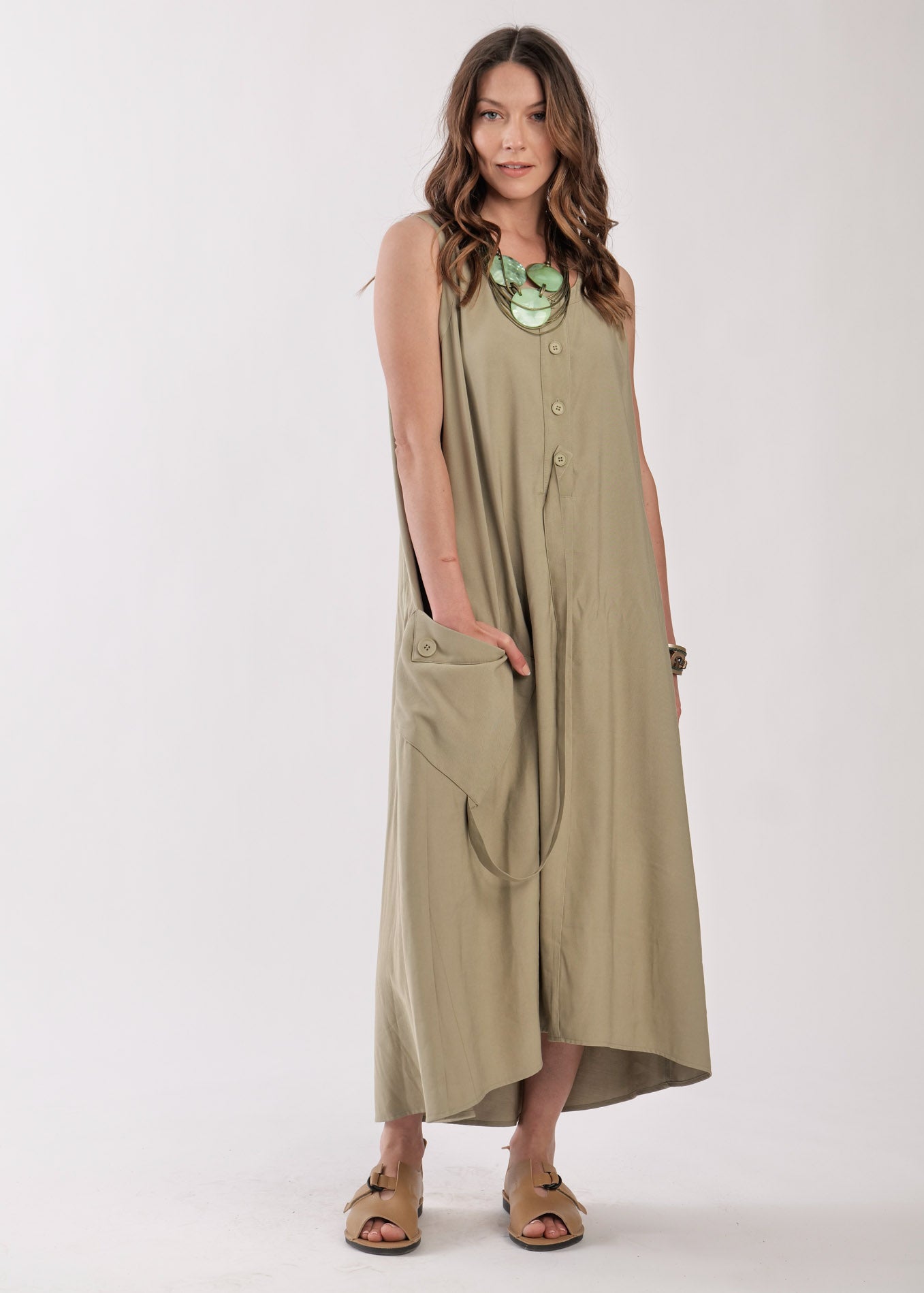 Dress with buttons and green diagonal pocket