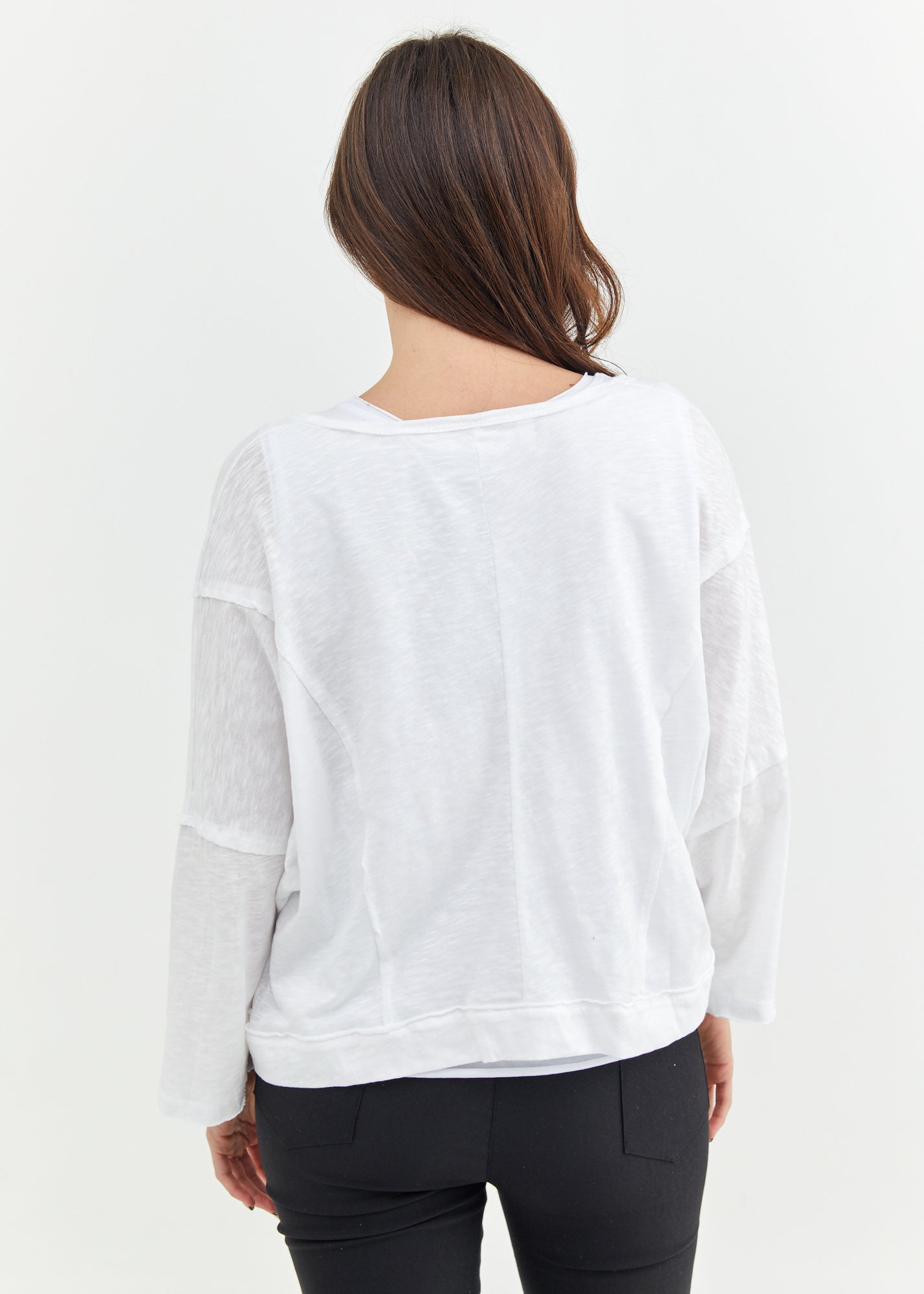 Asymmetric top with a white button