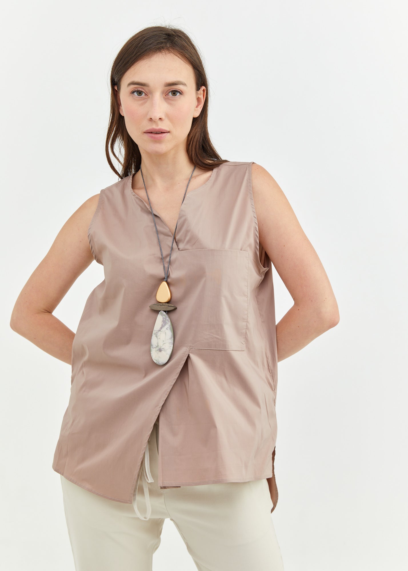 Asymmetric tank top and brown fabric pocket