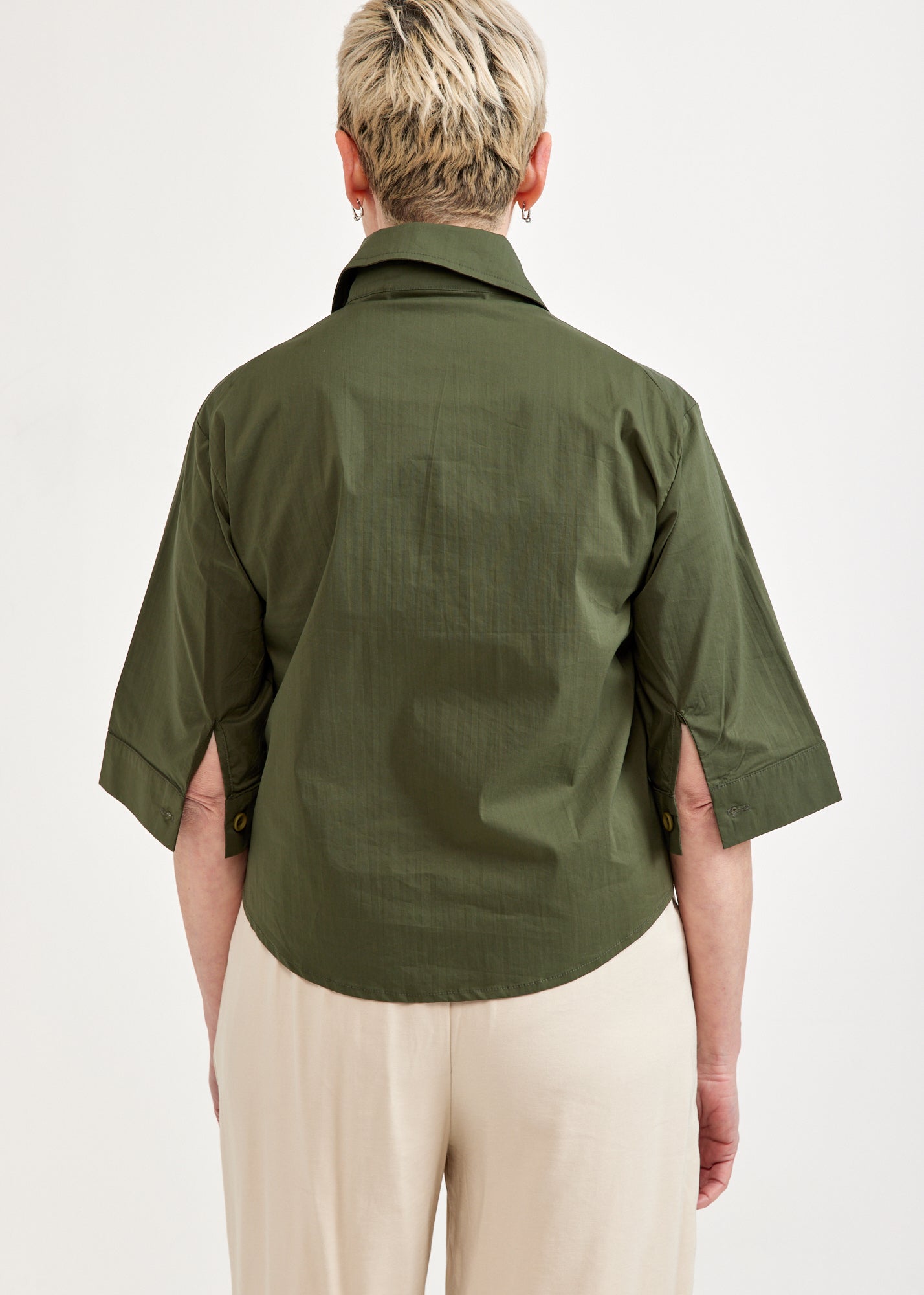 Short button-up with a green pocket