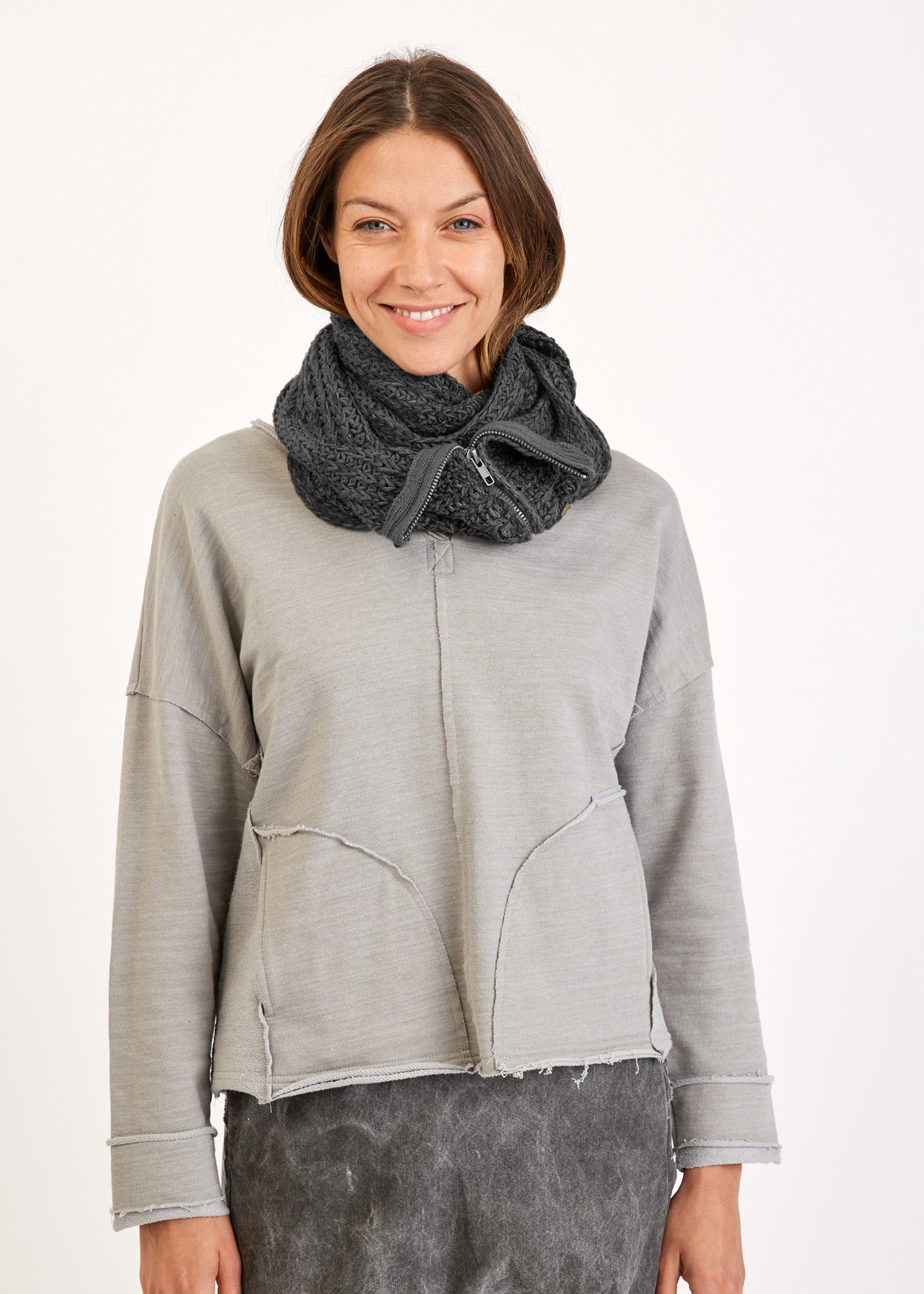 Scarf with a dark gray zipper